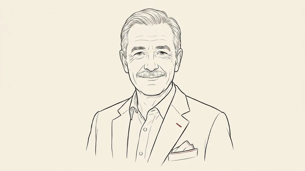 Ink portrait of an older French gentleman with a kindly explanatory smile